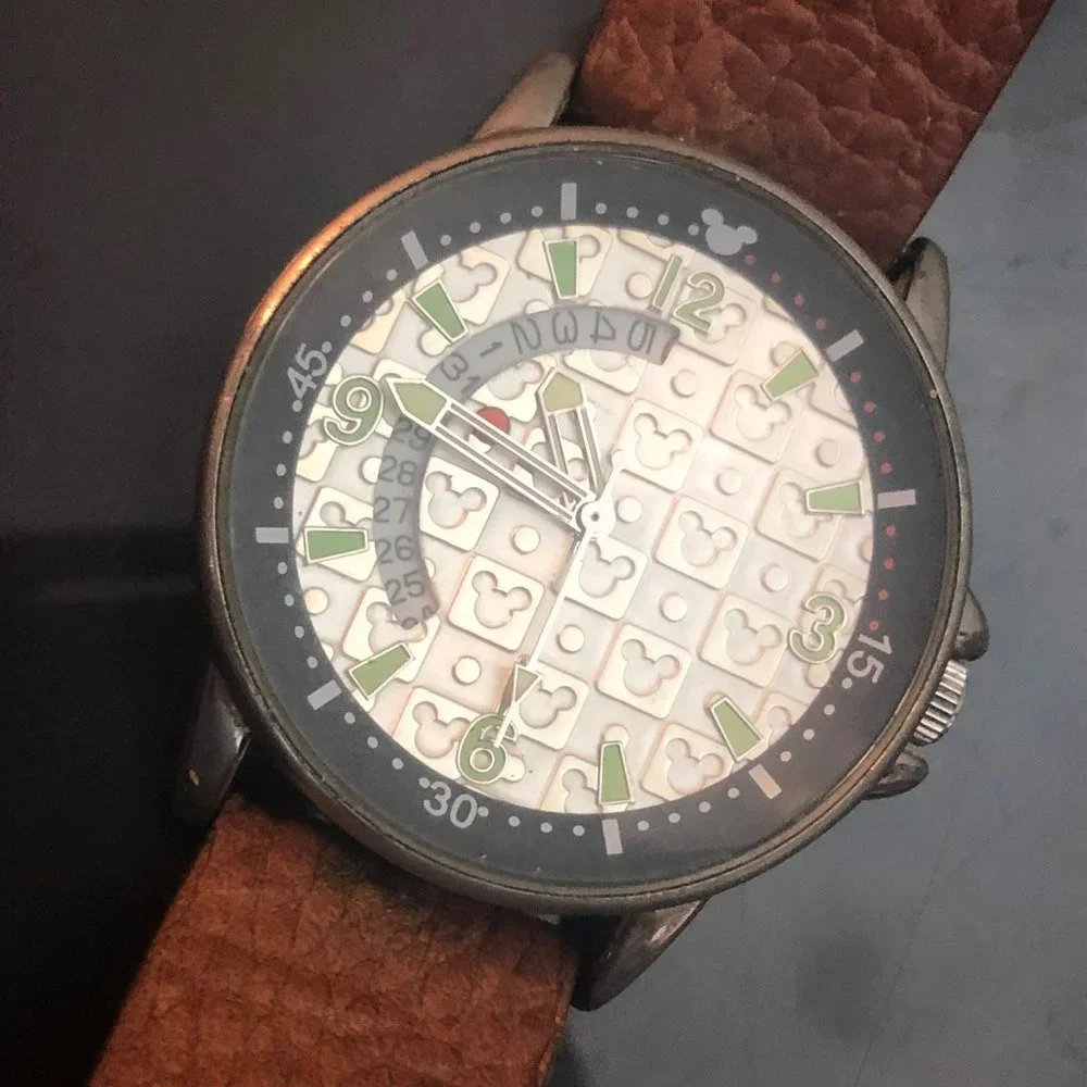 Disney Time Works Swing Glowing Date Watch